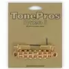 TonePros TP7-G - Tune-o-matic Bridge, 7-strun, mostek do gitary, z�oty